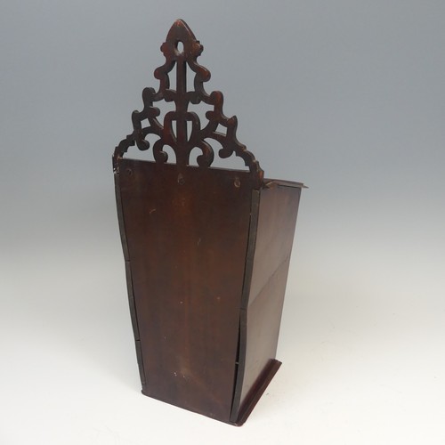 421 - A George III mahogany wall hanging candle Box, with heavily pierced scroll apron above tapering and ... 