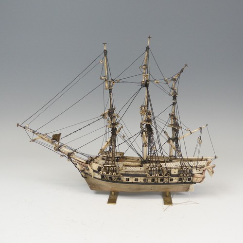 56 - 19th century Napoleonic Prisoner of War carved bone model of a three mast thirty-six gun Frigate, on... 