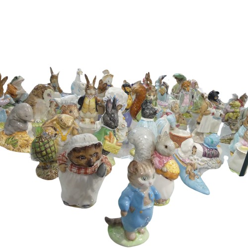 112 - A large collection of Beswick Beatrix Potter Figures, to comprise Pig-Wig, Sally Henny Penny, Anna M... 