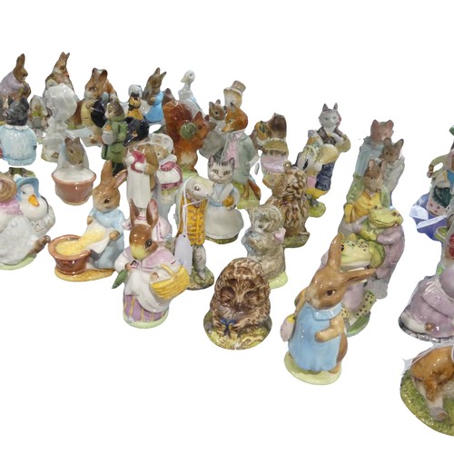 112 - A large collection of Beswick Beatrix Potter Figures, to comprise Pig-Wig, Sally Henny Penny, Anna M... 