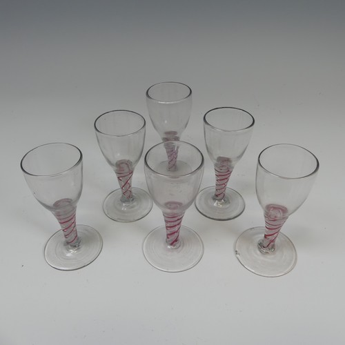 78 - A matched set of six good quality antique Wine Glasses, probably 18th century, the ovoil bowl on red... 