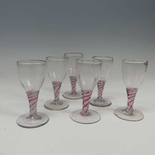 78 - A matched set of six good quality antique Wine Glasses, probably 18th century, the ovoil bowl on red... 