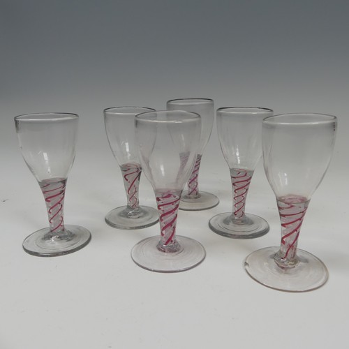 78 - A matched set of six good quality antique Wine Glasses, probably 18th century, the ovoil bowl on red... 