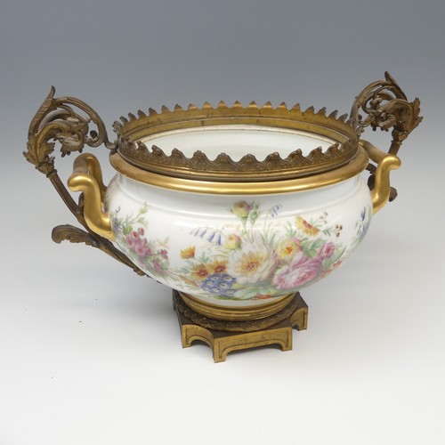 120 - A Sevres porcelain Chateau de Fontainebleau ormolu mounted Centrepiece, the twin handled Bowl with h... 