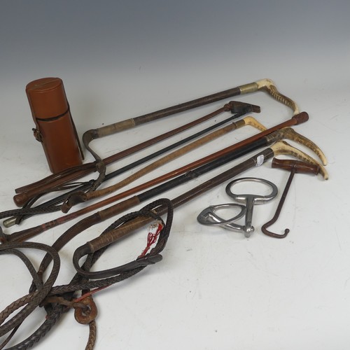 346 - A silver mounted riding Crop by 'Whippy Saddler, London', together with another silver mounted ridin... 