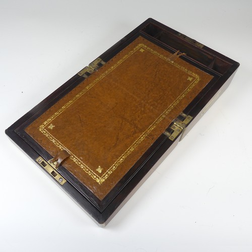 348 - A 19th century mahogany and brass bound campaign writing Slope, of small proportions, hinged top con... 