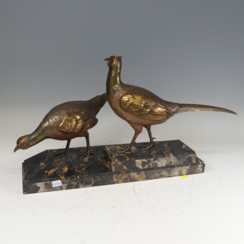 283 - An Art Deco gilt bronze Centrepiece modelled as a pair of Pheasants, signed 'I Gallo', on a stepped ... 