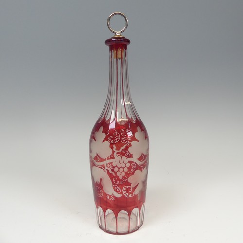 131 - A good cut and etched Ruby Flash glass Decanter, H 30 cm, together with two other etched glass and m... 