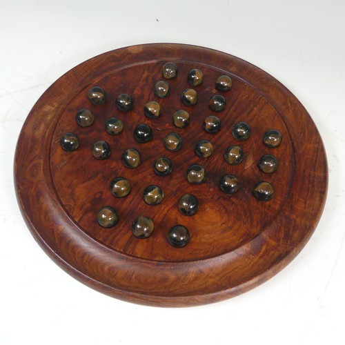 492 - A vintage Solitaire Board, complete with Marbles.