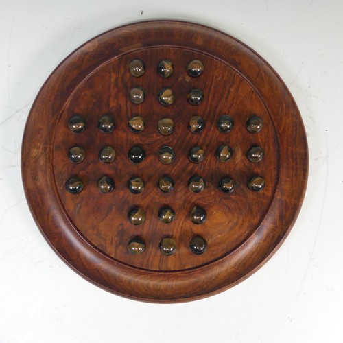 492 - A vintage Solitaire Board, complete with Marbles.