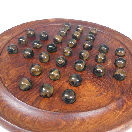 492 - A vintage Solitaire Board, complete with Marbles.