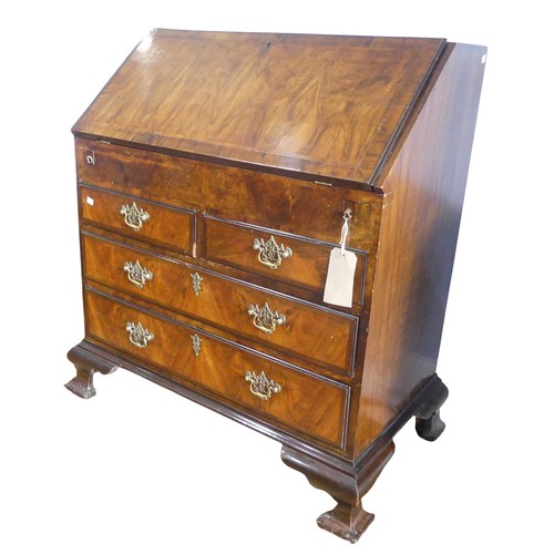 351 - A small Georgian mahogany Bureau, sloped fall front concealing fitted interior with ; pigeon holes, ... 