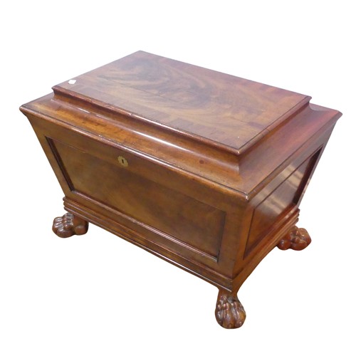 352 - A Georgian mahogany sarcophagus Wine Cooler, moulded hinged top concealing lined interior, raised on... 