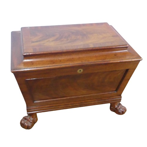 352 - A Georgian mahogany sarcophagus Wine Cooler, moulded hinged top concealing lined interior, raised on... 