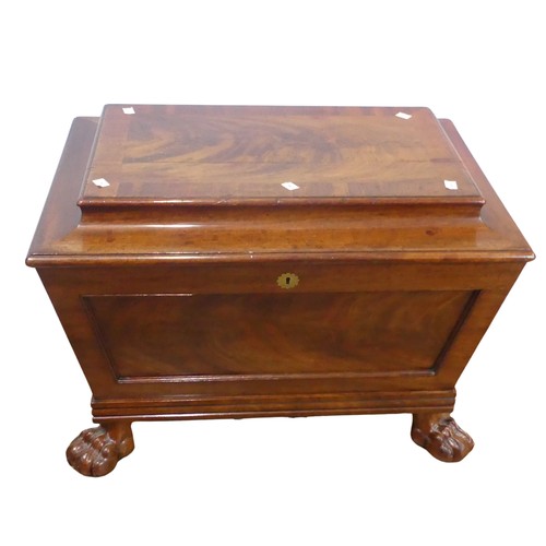 352 - A Georgian mahogany sarcophagus Wine Cooler, moulded hinged top concealing lined interior, raised on... 