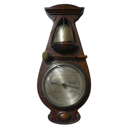 298 - An early 20th century oak gong Barometer by Delharty, with original striker, W 22 cm x H 50 cm.... 