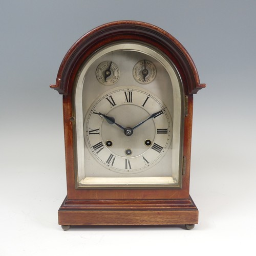 300 - A mahogany chiming and striking Mantle Clock, the silvered dial with Roman numerals, chime, silent, ... 