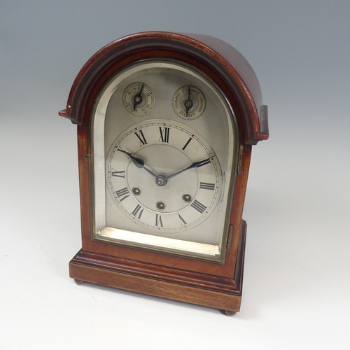 300 - A mahogany chiming and striking Mantle Clock, the silvered dial with Roman numerals, chime, silent, ... 