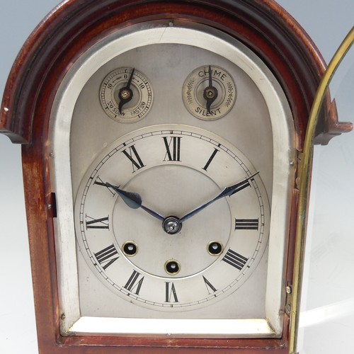 300 - A mahogany chiming and striking Mantle Clock, the silvered dial with Roman numerals, chime, silent, ... 