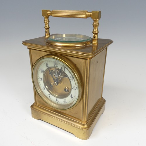 301 - A large French brass carriage Clock, the dial centre inset with the visible lever escapement and ena... 