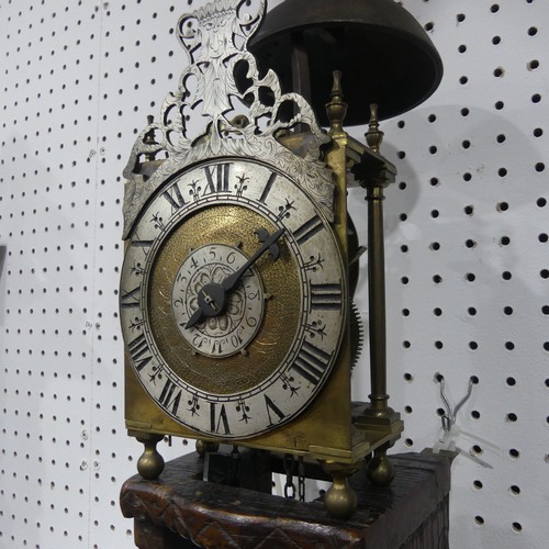 302 - An antique late 17th century style Lantern Clock and Bracket, probably Victorian, silvered 6 inch ch... 