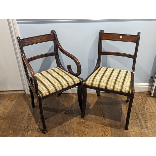 623 - A set of twelve Regency style mahogany and brass inlay bar-back Dining Chairs, including two carvers... 