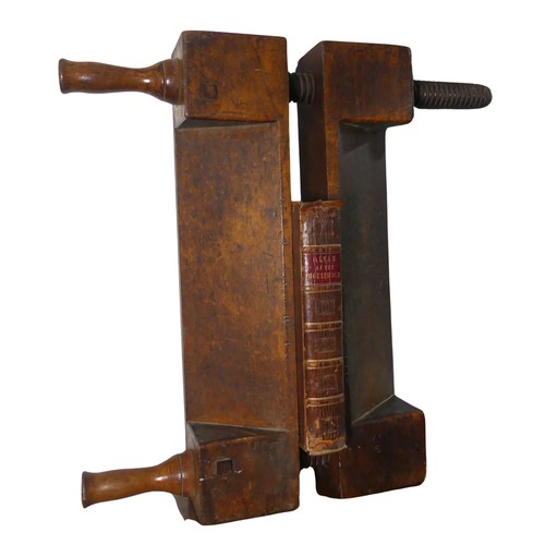 339 - An antique oak book-binder's laying Press, with antiquarian book, W 61 cm x H 61 cm x D 11 cm.... 