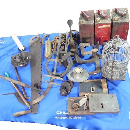 654 - A large quantity of garden Tools and other items, including ; a saw, oil cans, weights, fire extingu... 