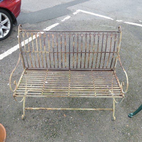 658 - A Regency style painted metal garden Bench, with wirework back and scroll arms and supports, W 103 c... 