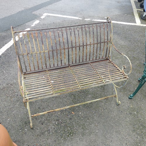 658 - A Regency style painted metal garden Bench, with wirework back and scroll arms and supports, W 103 c... 