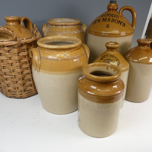 132 - A antique quantity of stoneware Flagons and Storage Jars, to comprise one in wicker surround, Wild B... 