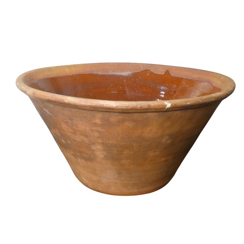 135 - A large 19th century terracotta pottery Mixing Bowl, with glazed interior, D 45cm x H 22cm.... 