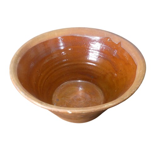 135 - A large 19th century terracotta pottery Mixing Bowl, with glazed interior, D 45cm x H 22cm.... 