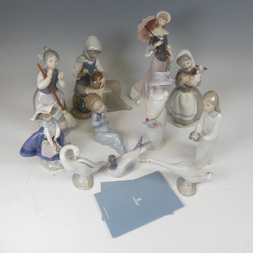 86 - A quantity of Lladro Figures, to include a figure of a Potter, 'A Sunny Day', six others including G... 