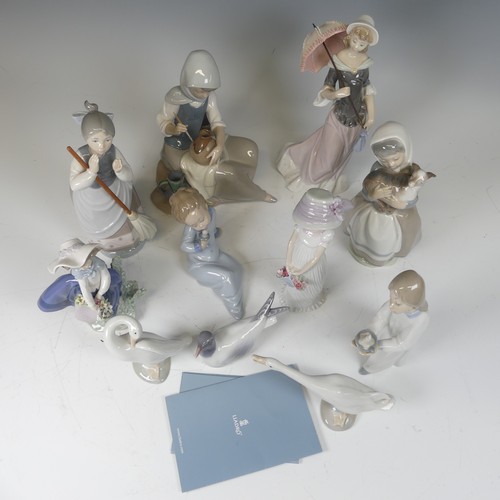 86 - A quantity of Lladro Figures, to include a figure of a Potter, 'A Sunny Day', six others including G... 