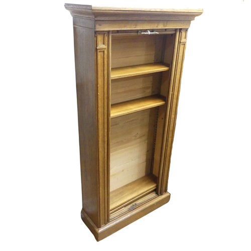 363 - A late 20th century tambour front Cabinet / Shelves, moulded cornice above Wellington chest style fr... 