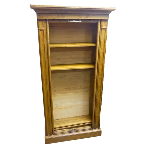 363 - A late 20th century tambour front Cabinet / Shelves, moulded cornice above Wellington chest style fr... 