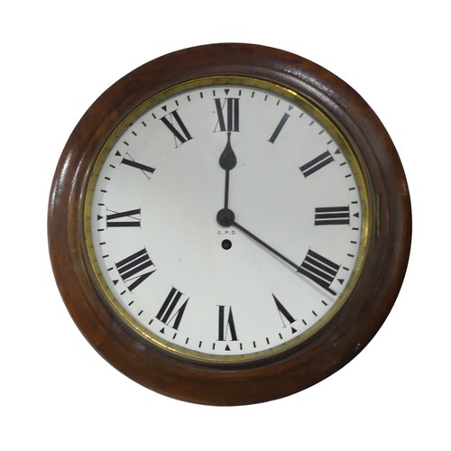 308 - A mahogany cased G.P.O wall Clock, white painted dial, Arabic numbers, minute baton markers, dial pa... 