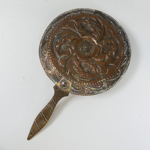 340 - John Pearson, an Arts and Crafts copper Chamber stick, repoussé decorated with stylised foliage on a... 