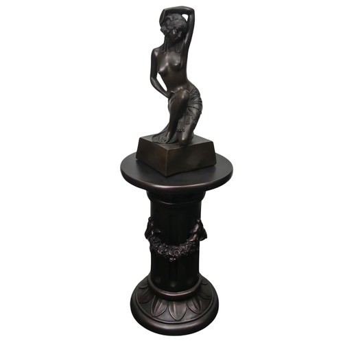 287 - A resin bronze nude Figure, raised on an associated contemporary column, H 90 cm.