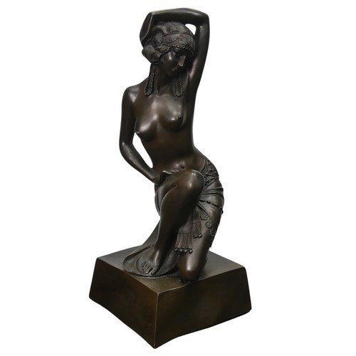 287 - A resin bronze nude Figure, raised on an associated contemporary column, H 90 cm.