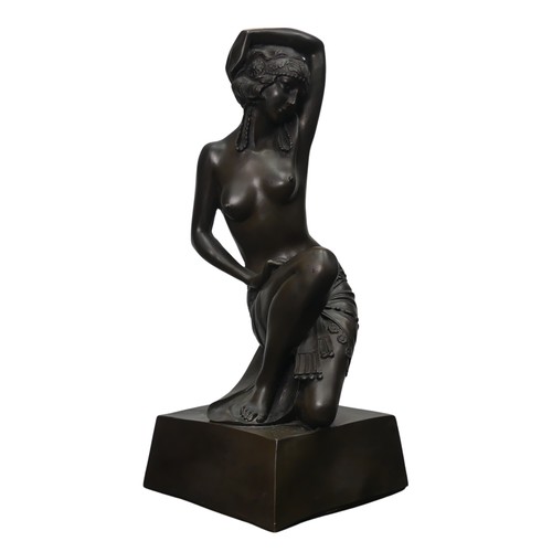 287 - A resin bronze nude Figure, raised on an associated contemporary column, H 90 cm.