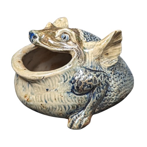98 - A fine Martin Brothers stoneware Spoon Warmer, dated 1879, in the grotesque form, the scaly creature... 