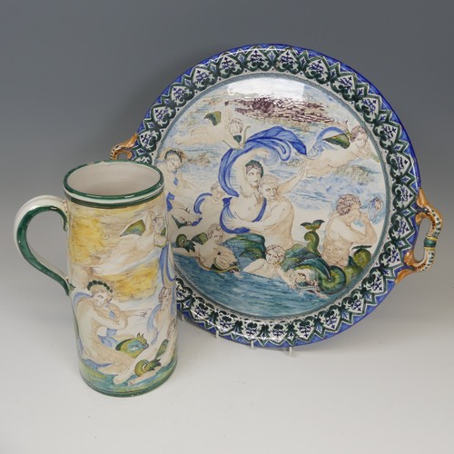 137 - A Continental majolica two-handled Charger/Tray, with a similar jug, both decorated in the style of ... 