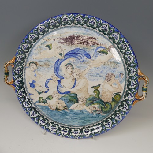 137 - A Continental majolica two-handled Charger/Tray, with a similar jug, both decorated in the style of ... 