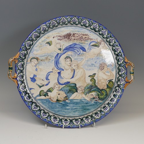 137 - A Continental majolica two-handled Charger/Tray, with a similar jug, both decorated in the style of ... 