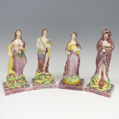 140 - A matched group of four Dixon, Austin and Co prattware Figures, early 19thC, modelled as the Four Se... 