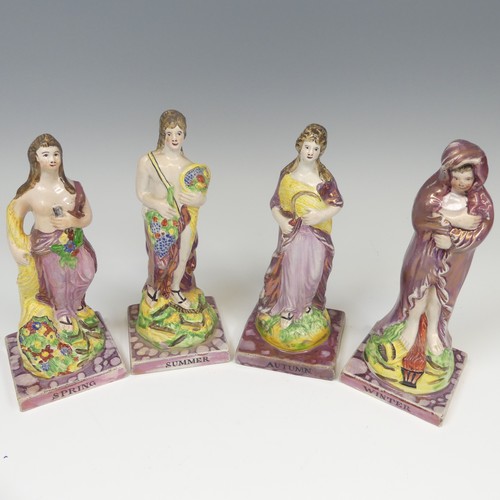 140 - A matched group of four Dixon, Austin and Co prattware Figures, early 19thC, modelled as the Four Se... 