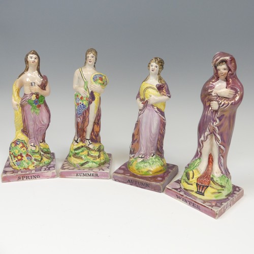 140 - A matched group of four Dixon, Austin and Co prattware Figures, early 19thC, modelled as the Four Se... 