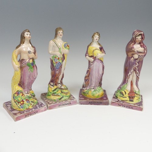 140 - A matched group of four Dixon, Austin and Co prattware Figures, early 19thC, modelled as the Four Se... 